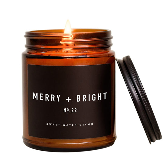 Sweet Water Decor Merry + Bright Soy Candle - Amber Jar - 9 oz - lily & onyx