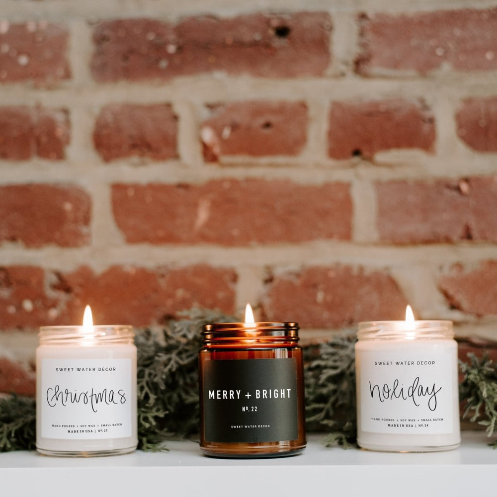 
                      
                        Sweet Water Decor Merry + Bright Soy Candle - Amber Jar - 9 oz - lily & onyx
                      
                    