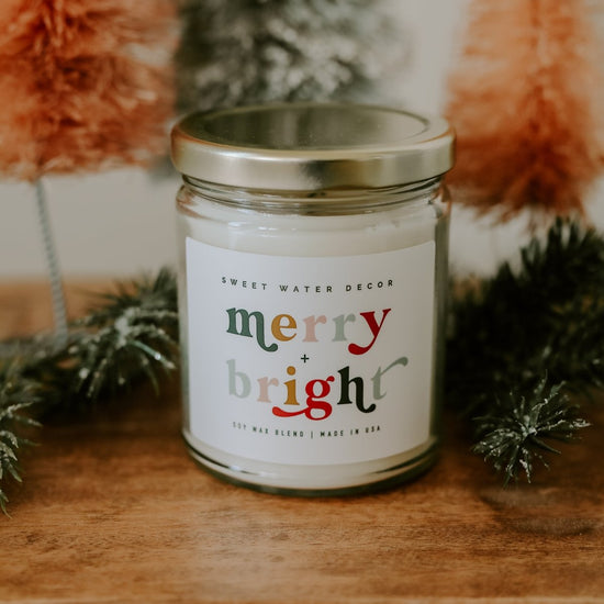Sweet Water Decor Merry + Bright Soy Candle - Clear Jar - 9 oz - lily & onyx