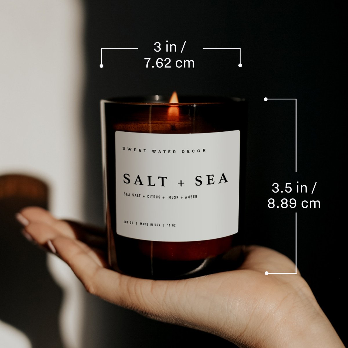 Sweet Water Decor Palo Santo Patchouli Soy Candle - Amber Jar - 11 oz - lily & onyx