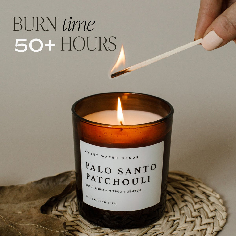 
                      
                        Sweet Water Decor Palo Santo Patchouli Soy Candle - Amber Jar - 11 oz - lily & onyx
                      
                    