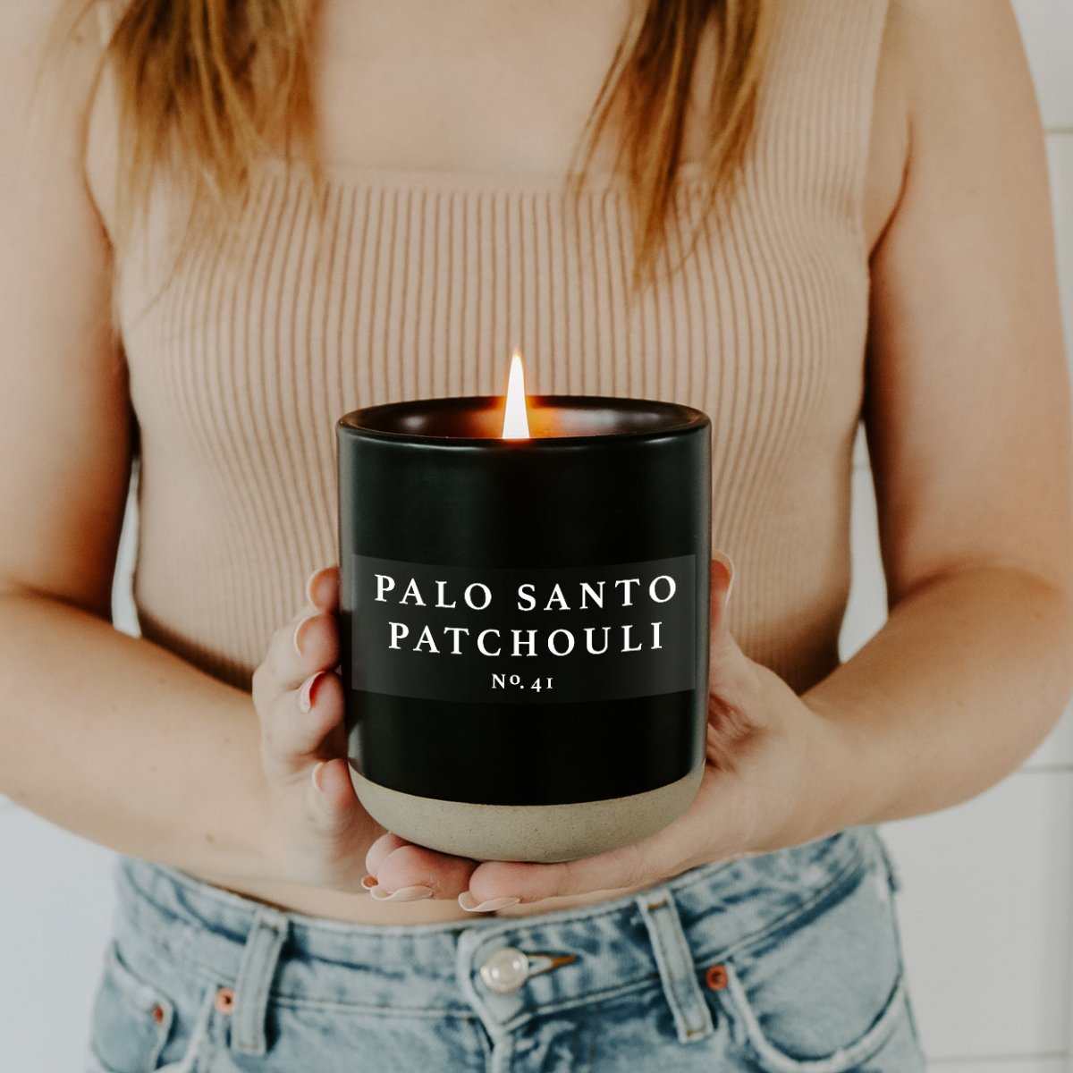 Sweet Water Decor Palo Santo Patchouli Soy Candle - Black Stoneware Jar - 12 oz - lily & onyx
