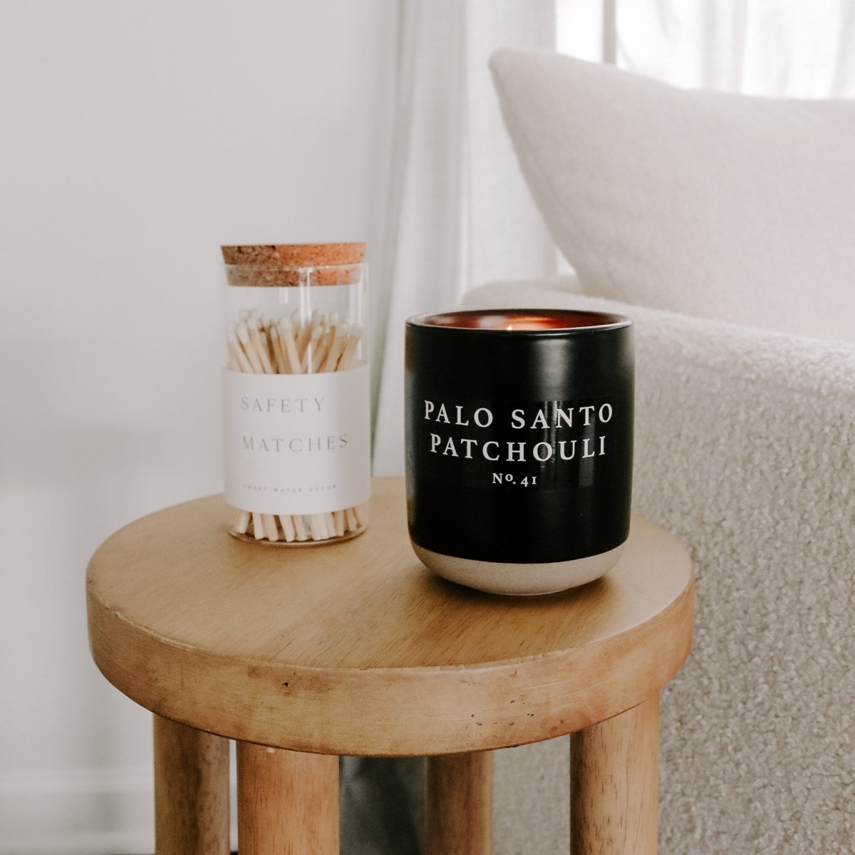 Load image into Gallery viewer, Sweet Water Decor Palo Santo Patchouli Soy Candle - Black Stoneware Jar - 12 oz - lily &amp;amp; onyx
