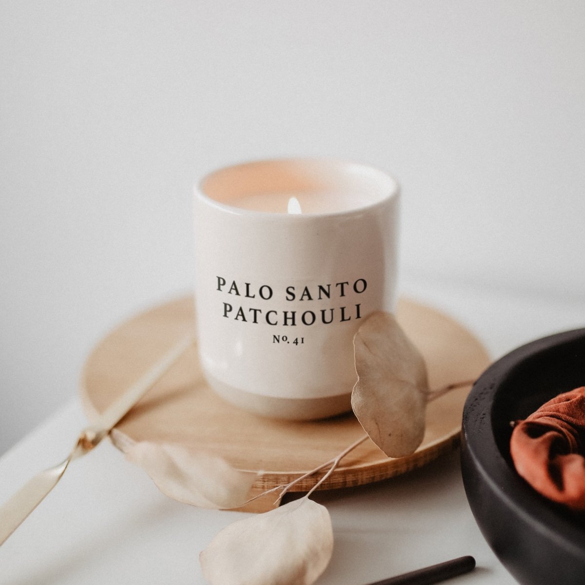 Load image into Gallery viewer, Sweet Water Decor Palo Santo Patchouli Soy Candle - Cream Stoneware Jar - 12 oz - lily &amp;amp; onyx
