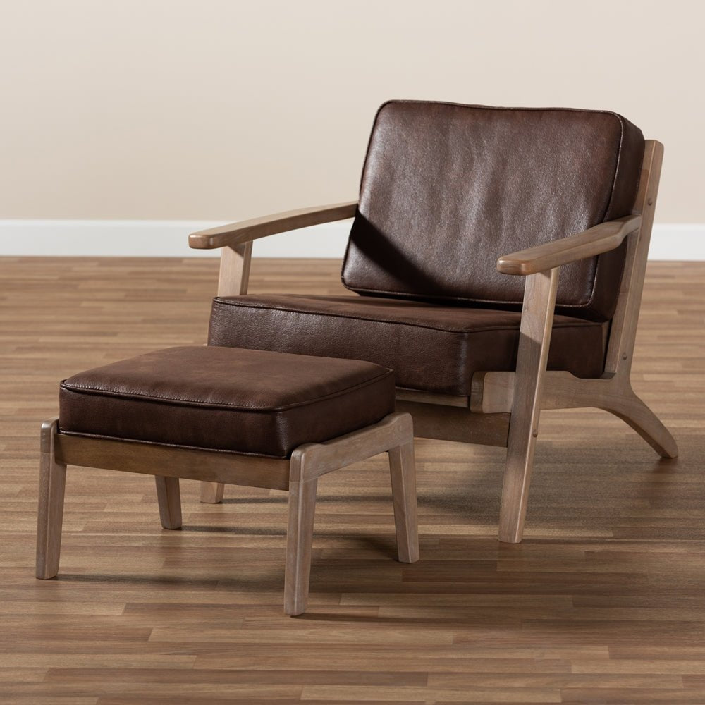 Load image into Gallery viewer, Baxton Studio Sigrid Mid Century Modern Dark Brown Faux Leather Upholstered Antique Oak Finished Wood Armchair - lily &amp;amp; onyx
