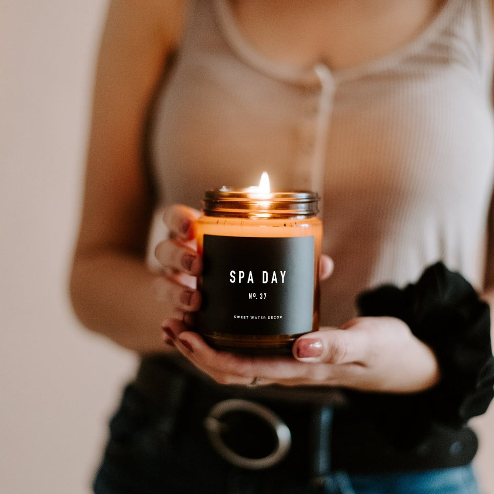 
                      
                        Sweet Water Decor Spa Day Soy Candle - Amber Jar - 9 oz - lily & onyx
                      
                    