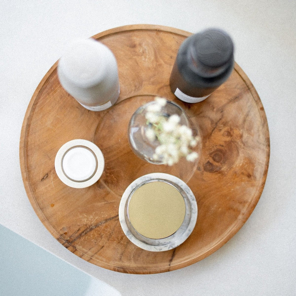 
                      
                        Aerial view of the Takara™ Teak Root Centerpiece Plate with various items on top.
                      
                    