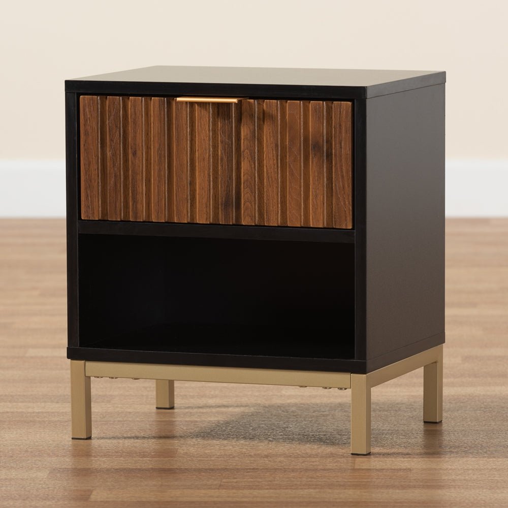 
                      
                        Baxton Studio Uriel Mid Century Modern Natural Brown & Black Finished Wood & Gold Metal Drawer Nightstand - lily & onyx
                      
                    